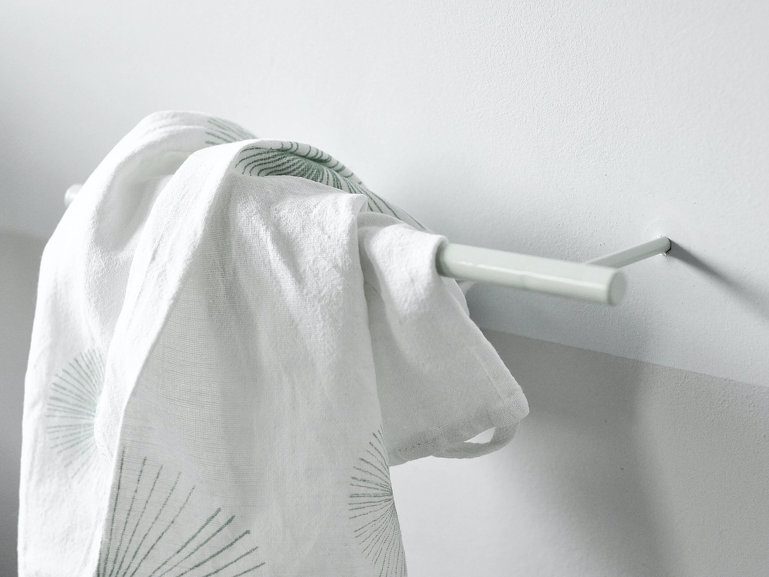 minimalist line hook towel holder design by kolor studio berlin analograum